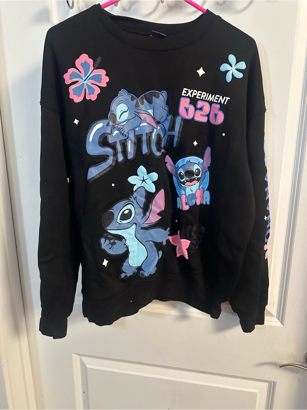 Disney Black Stitch Pullover Sweatshirt with Blue and Pink Graphics